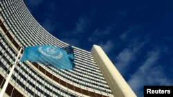 Trụ sở Cơ quan Nguyên tử năng Quốc tế. Cơ quan của Liên Hiệp Quốc nói chất uranium và nước nặng tồn kho của Iran nằm trong giới hạn được đồng ý.