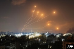 Фото: Система "Залізний купол" в Ізраїлі перехоплює ракети, запущені з Сектору Гази 11 жовтня 2023 року. (Mahmud Hams/AFP)