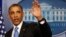 U.S. President Barack Obama waves after speaking in the Brady Press Briefing Room at the White House in Washington, April 30, 2013.