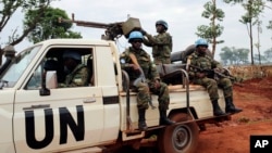 FILE - U.N. peacekeepers patrol outside Bria, Central African Republic, May 26, 2017. 