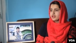 Shagofa Alikozay, who grew up in Afghanistan, talks about her award-winning photograph, which was displayed in Smithsonian museum in Washington, D.C., in this image taken from video.
