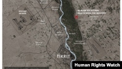 This image provided by Human Rights Watch shows the location of a Sept. 1, 2014 airstrike near Tikrit, Iraq.