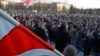 People shout slogans at a rally in the city of Maladzyechna, Belarus, March 10, 2017. 