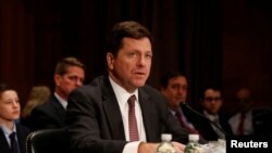 FILE - Jay Clayton testifies at a Senate Banking, Housing and Urban Affairs Committee hearing on his nomination of to be chairman of the Securities and Exchange Commission (SEC) on Capitol Hill in Washington, March 23, 2017.