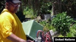 A renewable energy project in Tokelau, supported by UNDP, converts solar-generated power to electricity. (Photo: UN/Ariane Rummery)