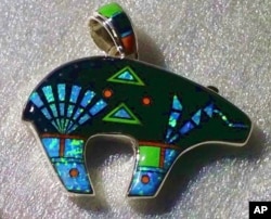 This photo is of a fake Native American piece of jewelry seized by federal officials in 2015 in New Mexico. This photo is provided by the U.S. Fish and Wildlife Service.