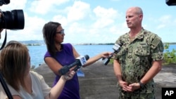 Joint Region Marianas Chief of Staff Capt. Jeff Grimes announces that joint exercises involving the U.S., U.K., France and Japan at the U.S. Pacific island of Guam have been indefinitely postponed after a French landing craft ran aground, May 12, 2017.