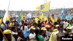 Supporters of Congolese President Joseph Kabila attend a pro-government rally in the Democratic Republic of Congo's capital Kinshasa, July 29, 2016.