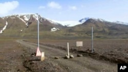 Image taken from video of a sign posted on the road next to Bardarbunga, a subglacial stratovolcano located under Iceland's largest glacier, August 19, 2014.