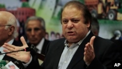 Nawaz Sharif address a news conference after launching his party manifesto for the coming parliamentary elections, in Lahore, March 7, 2013.