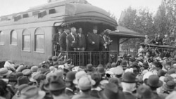 William Howard Taft, center, speaking from the back of a rail car during the presidential campaign of 1908