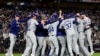 Los Angeles Dodgers players and coaches celebrate after winning the 2024 MLB World Series against the New York Yankees at Yankee Stadium, October 30, 2024. (Vincent Carchietta-Imagn Images)