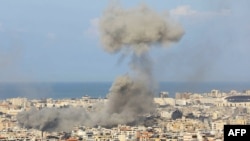 Smoke rises from the site of an Israeli airstrike that targeted the district of Haret Hreik in Beirut's southern suburbs on Nov. 16, 2024.