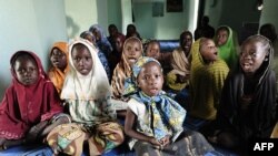 Des enfants maliens chantent dans une école coranique à Gao, dans le nord du Mali, le 13 février 2013.