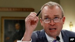 FILE - Budget Director Mick Mulvaney testifies on Capitol Hill in Washington, May 24, 2017, before a House Budget Committee hearing on President Donald Trump's fiscal 2018 budget. 