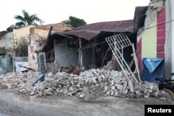 A home is seen collapsed after an earthquake in Guanica, Puerto Rico, Jan. 7, 2020.