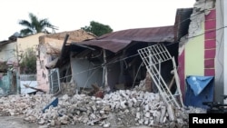 A home is seen collapsed after an earthquake in Guanica, Puerto Rico, Jan. 7, 2020. 