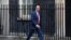 FILE - Britain's Foreign Secretary Dominic Raab arrives in Downing Street in central London on October 8, 2019 for a meeting of the Cabinet.