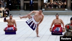 Japanese grand sumo champion Yokozuna Kisenosato performs the New Year's ring-entering rite at the annual celebration for the New Year at Meiji Shrine in Tokyo, Japan January 9, 2018.