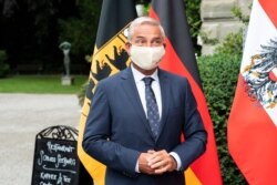 FILE - Thomas Strobl, Minister of the Interior, Digitalisation and Migration, arrives to a meeting in Kreuzlingen, Switzerland, June 17, 2020.