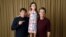 In this Sept. 9, 2017 photo, writer-director Sean Baker, from left, actress Brooklynn Prince and actor Willem Dafoe pose together to promote their film, "The Florida Project," during the Toronto International Film Festival in Toronto.