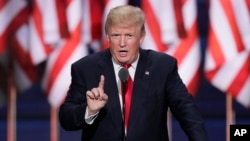 FILE - Republican Presidential candidate Donald J. Trump speaks during the final day of the Republican National Convention in Cleveland, July 21, 2016. Rallies in Florida to support Republican Presidential candidate Trump requested by Russian adversaries are one small facet of the indictment issued Friday by special counsel Robert Mueller charging 13 Russians and three Russia companies with interfering in the 2016 election.