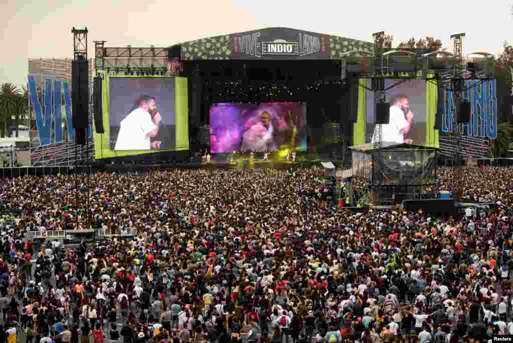 Thousands of music fans attend the music festival "Vive Latino" as Mexico's health authorities began rolling out tougher measures to contain the spread of coronavirus and calling for an end to large gatherings, in Mexico City, March 15, 2020.