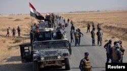 Federal police forces take part in an operation against Islamic State militants in south of Mosul, Oct. 26, 2016.