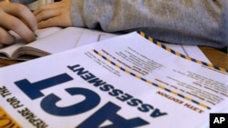 FILE - An ACT assessment test is seen in Springfield, Ill., April 1, 2014.