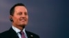 FILE - Ambassador Richard Grenell, then-President Trump's envoy for the Kosovo-Serbia dialogue, listens Serbian president during a press conference after their meeting, in Belgrade, Jan. 24, 2020.