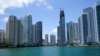 FILE - The skyline of Miami is seen at the entrance to the Miami River from a boat on Biscayne Bay, May 9, 2022.