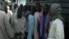 FILE - Nigerian refugees are seen at a gathering point before being repatriated to Nigeria, in Fotokol, Cameroon, April 19, 2017. (M.E. Kindzeka/VOA)