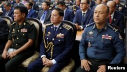 Cambodia's national police chief Neth Savoeun (C) attends an event at the Ministry of Interior in Phnom Penh, on Feb. 14, 2019. Reuters' recent investigation revealed that he and his family had obtained or applied for Cypriot nationality using an investment-to-citizenship scheme.