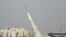 A rocket is launched from the Israeli anti-missile system known as Iron Dome, March 12, 2012. (AP)