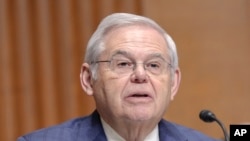 FILE - U.S. Senator Robert Menendez asks a question during a Senate Finance Committee hearing on Capitol Hill, in Washington, on March 14, 2024. 