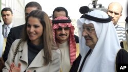 FILE - Saudi Prince Talal bin Abdulaziz, right, and Queen Rania of Jordan, left, attend the opening ceremony of the Arab Open University, Jordan branch, in Amman, Jordan, Feb. 24, 2010. 