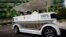 FILE - People ride on a driverless electric vehicle at the Nanyang Technological University (NTU) in Singapore.