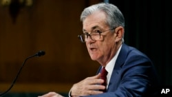 Federal Reserve Chair Jerome Powell presents the monetary policy report to the Senate Banking Committee, July 11, 2019, on Capitol Hill in Washington.