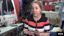 버지니아주 샬러츠빌에서 남편과 함께 '야디의 옷 수선 가게'를 운영하는 이란 출신 파르빈 자말레자.
