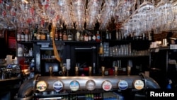 A view of a bar counter in central Brussels, as the country began easing lockdown restrictions following the coronavirus disease (COVID-19) outbreak in Belgium, June 4, 2020. (REUTERS/Francois Lenoir)