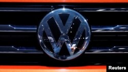 FILE - The Volkswagen logo is seen on a vehicle in New York, March 29, 2018. 