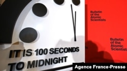 FILE - The Doomsday Clock, seen at the National Press Club in Washington, Jan. 23, 2020, reads 100 seconds to midnight.