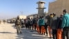 Surrendered ISIS members are taken under SDF control in Hasakah prison