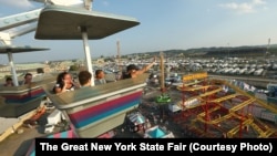 A wide view of the rides at the New York State Fair.