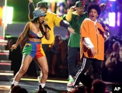 FILE - Cardi B and Bruno Mars perform "Finesse" at the 60th annual Grammy Awards at Madison Square Garden in New York, Jan. 28, 2018.