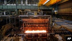 FILE - In this photo taken May 31, 2012, a furnace of the Mobarakeh Steel Complex is seen, 280 miles (460 kilometers) south of Tehran. 