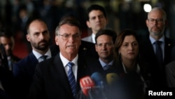 Brazilian President Jair Bolsonaro gives a press statement at the Alvorada Palace in Brasilia, Brazil, Nov. 1, 2022. 