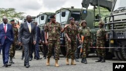 Kenya's President, William Ruto and his deputy Rigathi Gachagua inspect a part of the fleet of vehicles to be used by Kenya Defence Forces soldiers deploying to the Democratic Republic of Congo as part of the East Africa Community Regional Force, November 2, 2022. 