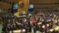 FILE - This United Nations handout photo shows participants at the opening of the 63rd session of the Commission on the Status of Women (CSW), March 11, 2019, at U.N. headquarters in New York.