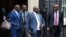 FILE - Timothy Harris, St Kitts and Nevis Prime Minister, and other Caribbean leaders and representatives leave following a meeting with Britain's Prime Minister Theresa May at 10 Downing Street in London, Britain, April 17, 2018.